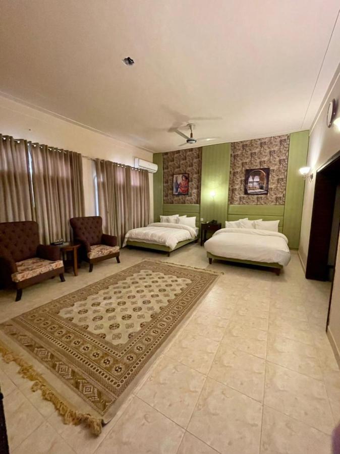 Shelton Hotel Mardan Bagian luar foto